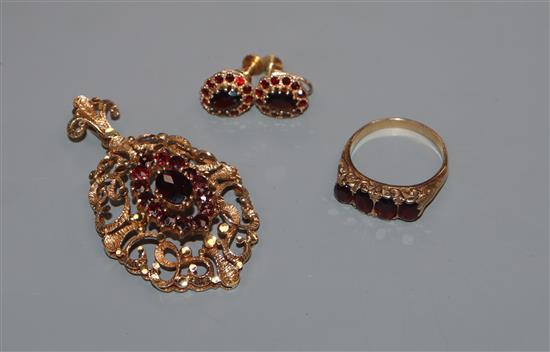 A modern Victorian style suite of 9ct and garnet set jewellery, comprising a ring, pendant and pair of earclips.